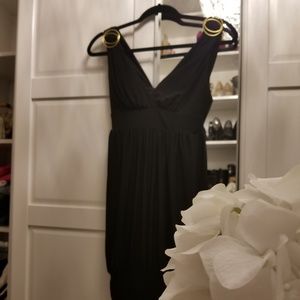 Black mini dress with gold detail